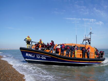 A group of people thought to be migrants are brought in to Dungeness, Kent, onboard the RNLI Life Boat following a small boat incident in the Channel. Picture date: Tuesday April 4, 2023. (Photo by Gareth Fuller/PA Images via Getty Images)