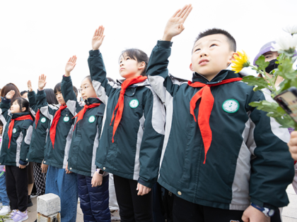 Primary school students salute at the Yuhuatai Martyrs Monument in Nanjing, East China's Jiangsu Province, April 5, 2023. Today is Tomb-Sweeping Day. (Photo credit should read CFOTO/Future Publishing via Getty Images)