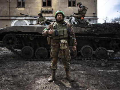 DONETSK OBLAST, UKRAINE - MARCH 29: Ukrainian soldiers pose in front of a tank amid Russia-Ukraine war on the frontline of Donetsk Oblast, Ukraine on March 29, 2023. (Photo by Muhammed Enes Yildirim/Anadolu Agency via Getty Images)