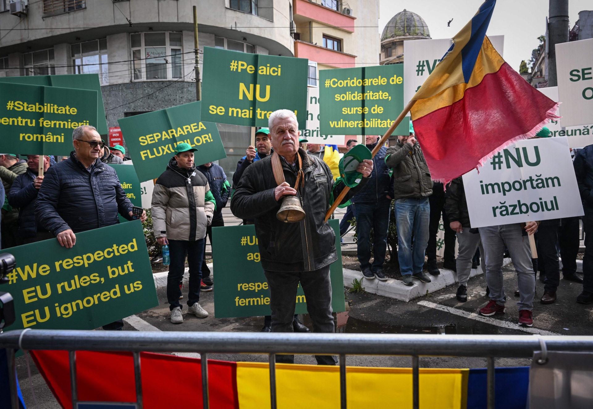 Romanian farmers protest in the front of the European Commision headquarters in Bucharest on April 7, 2023. - Farmers gather on a national-wide protest against insufficient compensation received from the EU funds after the complete elimination of customs duties on all goods from Ukraine since the middle of last year. (Photo by Daniel MIHAILESCU / AFP) (Photo by DANIEL MIHAILESCU/AFP via Getty Images)