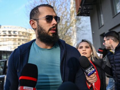 Controversial influencer Andrew Tate arrives at the Directorate for the Investigation of Organized Crime and Terrorism (DIICOT) to attend a hearing on April 10, 2023. - Andrew Tate and his brother Tristan were released after three months of pre-trial detention in Romania and moved to house arrest while they continue …