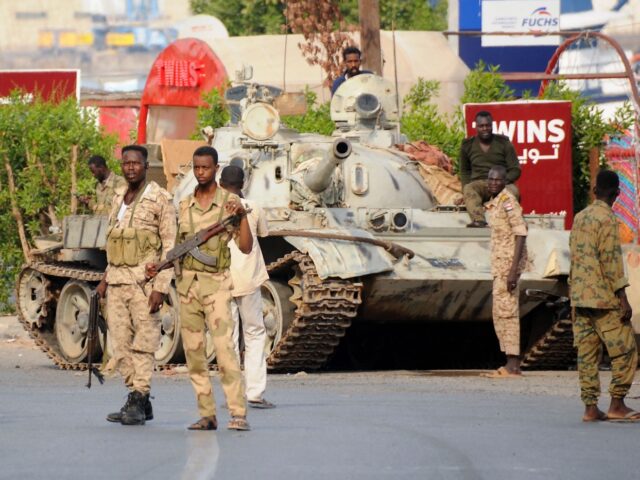 Sudanese army soldiers, loyal to army chief Abdel Fattah al-Burhan, man a position in the