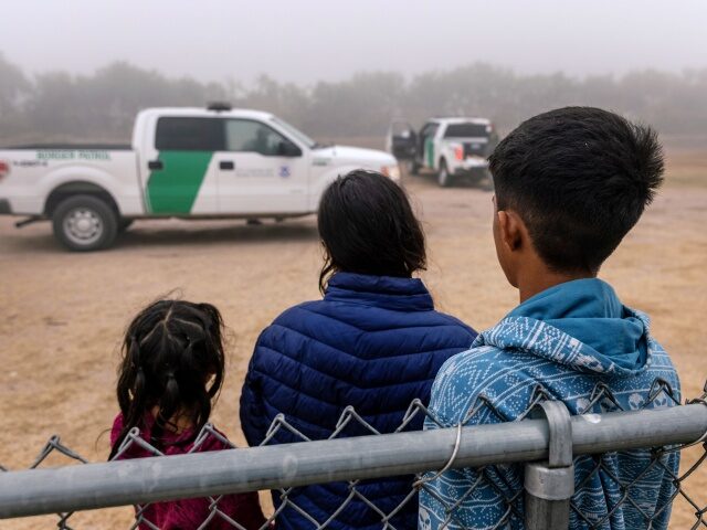 LA JOYA, TEXAS - APRIL 10: Unaccompanied minors wait to be processed by U.S. Border Patrol