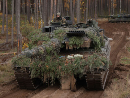 PABRADE, LITHUANIA - OCTOBER 27: Two Leopard 2A6 main battle tanks of the Bundeswehr, the German armed forces, participate in the NATO Iron Wolf military exercises on October 27, 2022 in Pabrade, Lithuania. Germany leads a NATO contingent of troops in Lithuania under the Enhanced Forward Presence (eFP) battle group, …