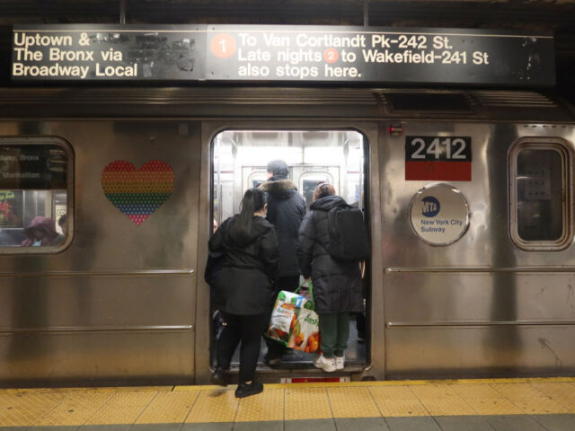 NEW YORK, NY - MARCH 27: People board a "1" line subway train at the Columbus Ci
