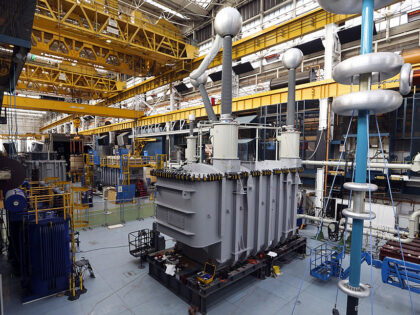 An industrial power transformer sits in a testing bay at Alstom SA's factory in Staff