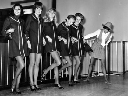 18th March 1968: English fashion designer Mary Quant with a group of models at Heathrow Airport, before leaving for a continental fashion tour. (Photo by Express/Express/Getty Images)