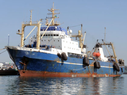 A Russian trawler "Oleg Naïdenov" ,is moored in Dakar on January 5, 2014. The ship was boarded after it was observed illegally fishing in Senegalese waters near the border with Guinea Bissau, Lieutenant-Colonel Adama Diop, a military communications officer, told AFP. AFP PHOTO/SEYLLOU (Photo credit should read SEYLLOU/AFP via Getty …