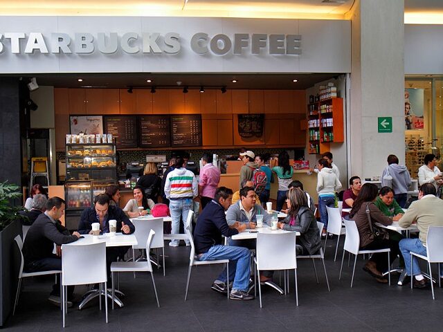 Mexico, Mexico City, Federal District, Reforma 222 mall, food court Starbucks. (Photo by: