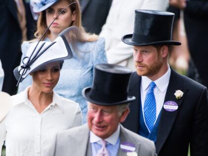 ASCOT, ENGLAND - JUNE 19: Meghan, Duchess of Sussex, Prince Charles, Prince of Wales and P