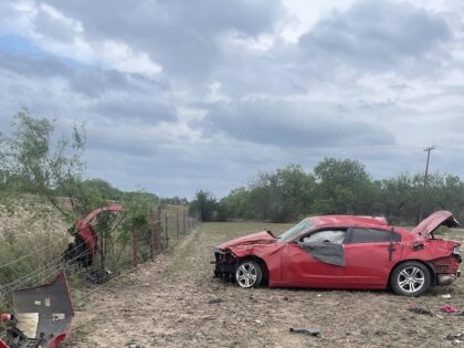 A rollover crash in South Texas left an alleged human smuggler and four migrants clinging