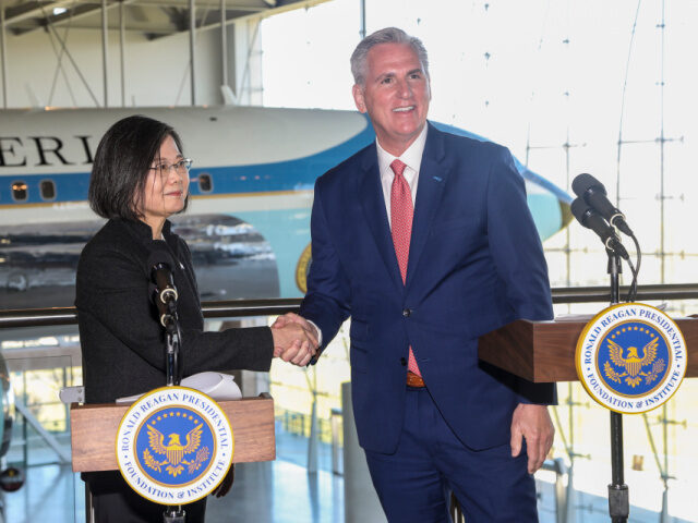 House Speaker Kevin McCarthy, R-Calif., right, shakes hands with Taiwanese President Tsai