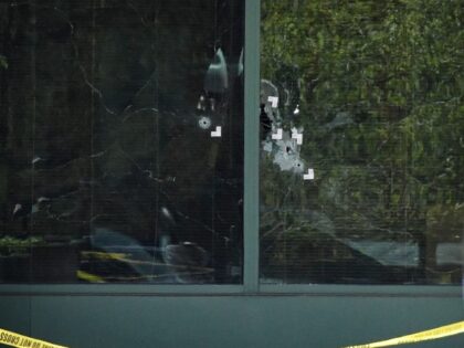 Louisville Shooting Bullet holes are seen in the front windows of the Old National Bank building in Louisville, Ky., Monday, April 10, 2023. A shooting at the bank killed and wounded several people police said. The suspected shooter was also dead. (Timothy D. Easley/AP)