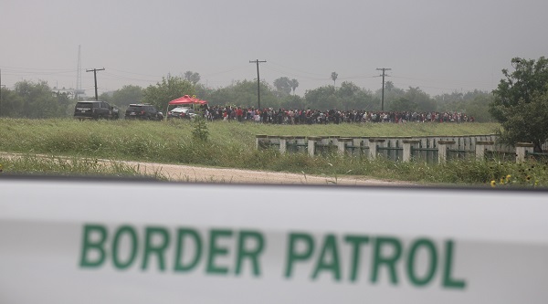 Large groups of migrants surrender to Border Patrol agents in Brownsville, Texas. (Randy Clark/Breitbart Texas)