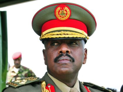 The son of Uganda's President Yoweri Museveni, Major General Muhoozi Kainerugaba attends a ceremony in which he was promoted from Brigadier to Major General at the country's military headquarters in Kampala on May 25, 2016. The son of Uganda's President Yoweri Museveni, one of Africa's longest-serving leaders, has rejected claims …