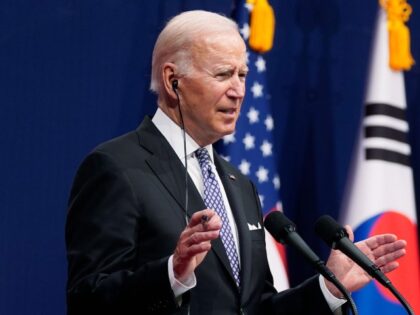 FILE - U.S. President Joe Biden, left, speaks as South Korean President Yoon Suk Yeol list