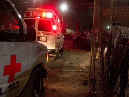 Mexican Red Cross ambulances enter the Apodaca State prison near Monterrey, Mexico Tuesday Feb. 21, 2012. About 50 women related to inmates clashed with police and set fire to a pile of cardboard and wood at a gate while inside the prison inmates set fire to mattresses and trash after …