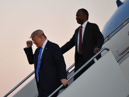 US President Donald Trump, followed by Housing and Urban Development Secretary Ben Carson, steps off Air Force One upon arrival at Fort Lauderdale-Hollywood International Airport in Fort Lauderdale, Florida on December 7, 2019. - Trump is in Florida to attend a Republican dinner and to address the Israeli American Council …