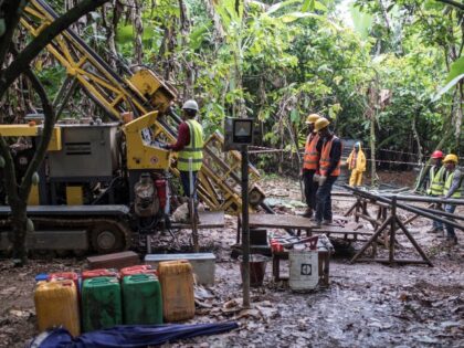 A mineral exploration drilling team drills holes to identify the location and the quality of gold deposits at the Segilola Gold Project site in the village of Iperindo-Odo Ijesha, near the city of Ilesha, Osun State, Nigeria, on May 29, 2018. - Nigeria is working to diversify its economy, which …