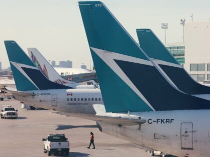 TORONTO, ON- MARCH 9 - WestJet planes sit on the tarmac at Terminal 3. Pearson International Airport is calm on the eve of one of the busiest stretches of holiday travel leading into the March Break in Toronto. March 9, 2023.