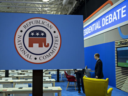 A Republican National Committee (RNC) sign stands in the media filing center ahead of the Republican presidential candidate debate in North Charleston, South Carolina, U.S., on Thursday, Jan. 14, 2016. Less than three weeks before Iowa caucus-goers cast the first votes of the 2016 presidential election, the Republican contest in …