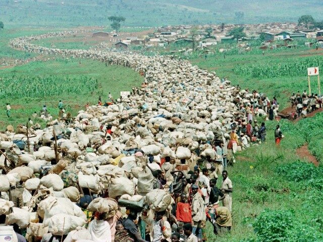 FILE - Tens of thousands of Rwandan refugees, who have been forced by Tanzanian authoritie