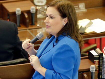 FILE - State Rep. Tricia Cotham, D-Mecklenburg, speaks on the House floor as North Carolin