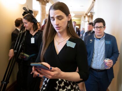 Rep. Zooey Zephyr looks on after speaking with the media at the Montana State Capitol in H