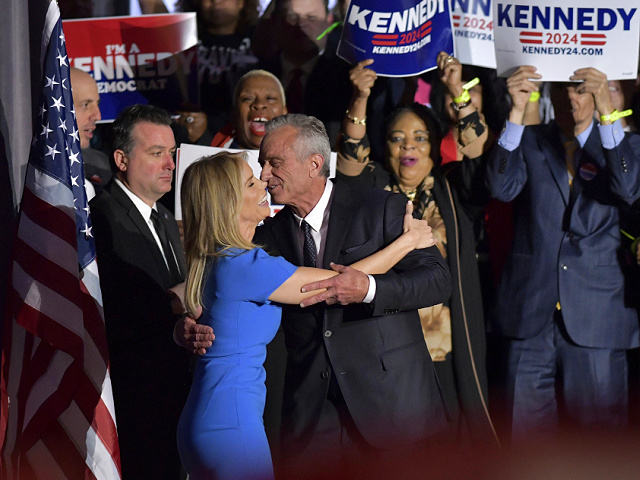 Cheryl Hines and her husband Robert F. Kennedy Jr. embrace at an event where Kennedy announced his run for president on Wednesday, April 19, 2023, at the Boston Park Plaza Hotel, in Boston. (AP Photo/Josh Reynolds)