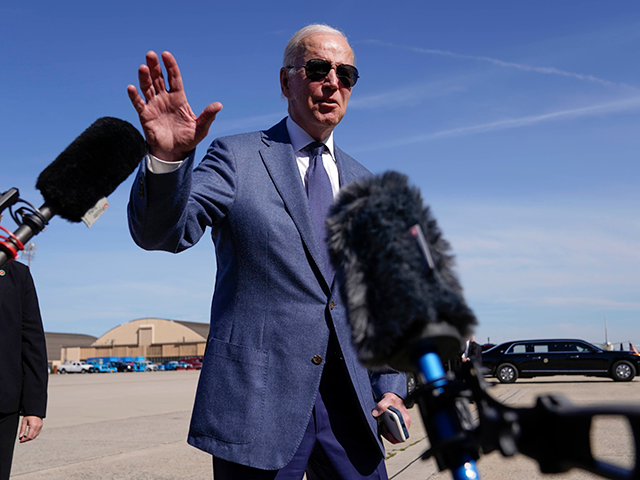 President Joe Biden talks to reporters before boarding Air Force One, Tuesday, April 11, 2023, at Andrews Air Force Base, Md. Biden is traveling the United Kingdom and Ireland in part to help celebrate the 25th anniversary of the Good Friday Agreement. (AP Photo/Patrick Semansky)