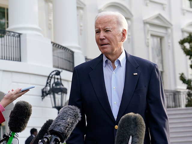 Oil - President Joe Biden talks with reporters on the South Lawn of the White House in Was