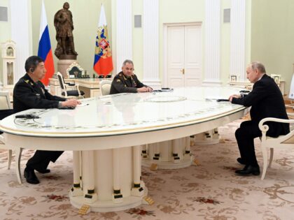 Russian President Vladimir Putin and Russian Defence Minister Sergei Shoigu meet with Chinese Defence Minister Li Shangfu at the Kremlin in Moscow on April 16, 2023. (Photo by Pavel BEDNYAKOV / SPUTNIK / AFP) (Photo by PAVEL BEDNYAKOV/SPUTNIK/AFP via Getty Images)
