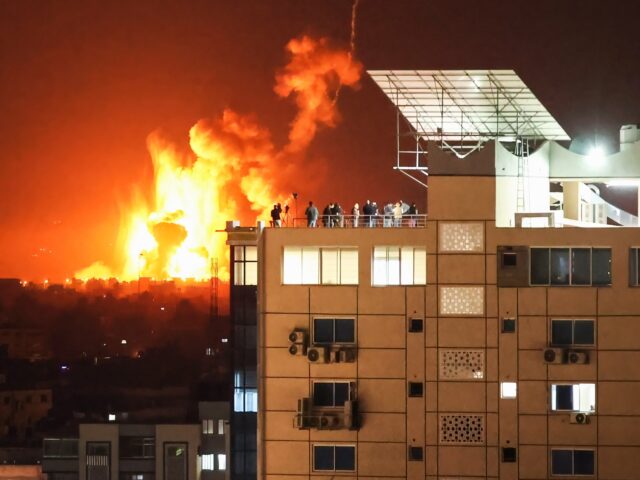 GAZA, PALESTINE - 2023/04/07: Fire and smoke rise following an Israeli airstrike in the ce