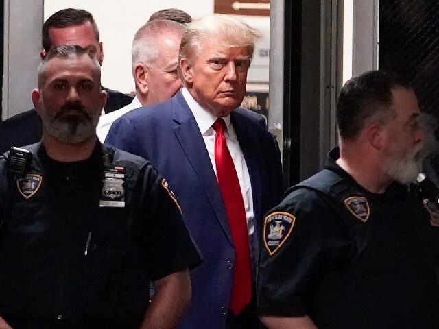 Former President Donald Trump arrives at court, Tuesday, April 4, 2023, in New York. Trump