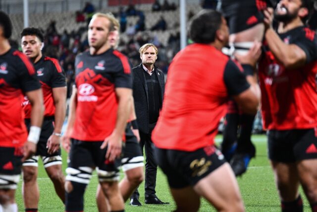 Crusaders' coach Scott Robertson (C) is relishing Saturday's Super Rugby clash at the unbe