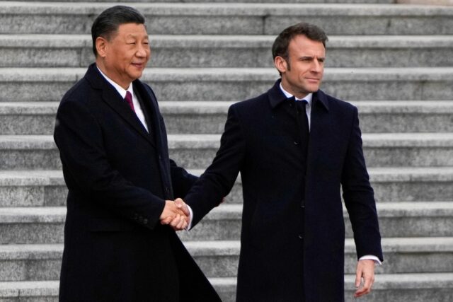French President Emmanuel Macron (R) met Chinese leader Xi Jinping during a three-day state visit last week