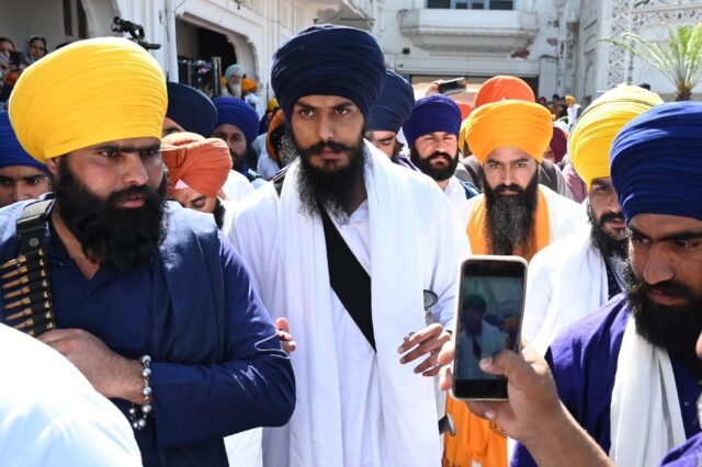 Indian police arrested firebrand Sikh separatist Amritpal Singh (C) after a manhunt lastin