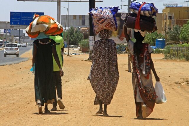 People flee from southern Khartoum on the fourth day of fighting