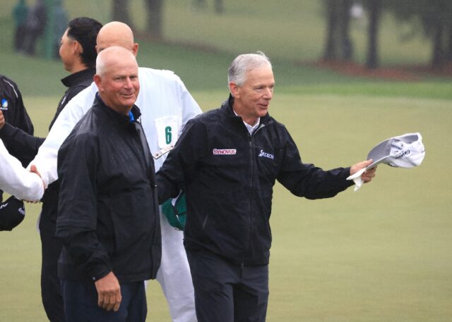 Scotsman Sandy Lyle, left, and hometown hero Larry Mize celebrated together at the 18th gr