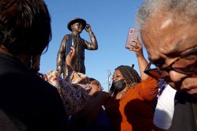 A statue of Emmett Till is unveiled on October 21, 2022 in Greenwood, Mississippi