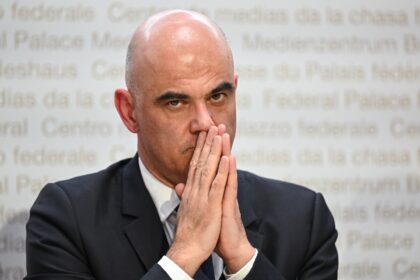 Swiss President Alain Berset addressed an extraordinary session of parliament called to de