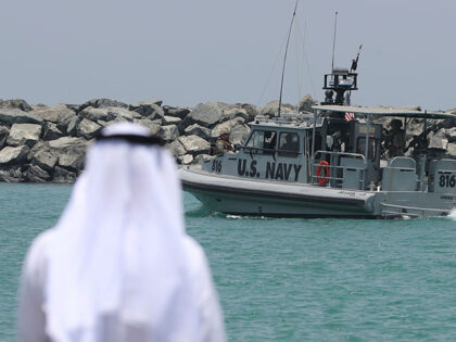 In this June 19, 2019 file photo, a U.S. Navy patrol boat carrying journalists to see dama