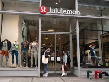 Lululemon fashions are displayed in company store windows, Thursday, March 25, 2021, in New York. Lululemon reports earnings, March 30, 2021. (AP Photo/Mark Lennihan)