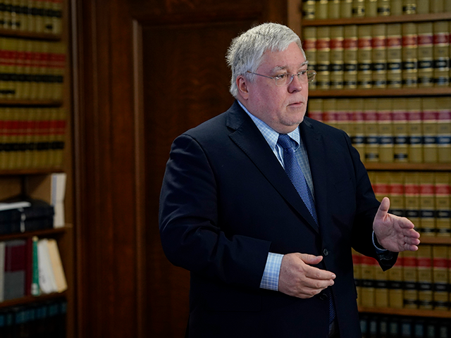 West Virginia Attorney General Patrick Morrisey speaks with reporters to announce a $68 mi