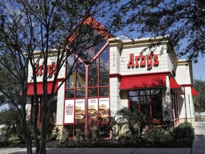 An Arby's restaurant is shown Tuesday, Nov. 28, 2017, in Valrico, Fla. Fast food chain Arby's is buying Buffalo Wild Wings. The deal is expected to close in 2018's first quarter. It still needs the approval of Buffalo Wild Wings shareholders. (AP Photo/Chris O'Meara)