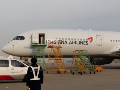 An Asiana Airlines Inc. aircraft parked outside the company's hanger at Incheon Inter