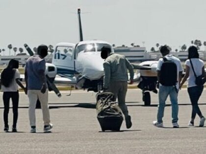 Harlingen Station agents and police officers interdict an alleged human smuggling incident at a local airport. (U.S. Border Patrol/Rio Grande Valley Sector)
