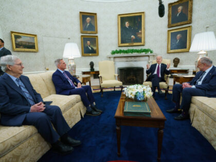 Senate Minority Leader Mitch McConnell of Ky., Speaker of the House Kevin McCarthy of Calif., and Senate Majority Leader Sen. Chuck Schumer of N.Y., listen as President Joe Biden speaks before a meeting to discuss the debt limit in the Oval Office of the White House, Tuesday, May 9, 2023, …