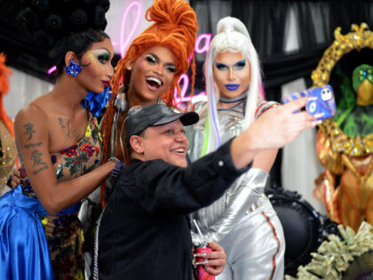 LOS ANGELES, CALIFORNIA - MAY 15: Angeria Paris VanMicheals, Olivia Lux and Alyssa Hunter pose with an attendee at RuPaul's DragCon at Los Angeles Convention Center on May 15, 2022 in Los Angeles, California. (Photo by Chelsea Guglielmino/WireImage)