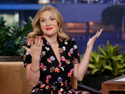 THE TONIGHT SHOW WITH JAY LENO -- Episode 4544 -- Pictured: (l-r) Actress Drew Barrymore during an interview with host Jay Leno on October 7, 2013 -- (Photo by: Paul Drinkwater/NBC/NBCU Photo Bank)